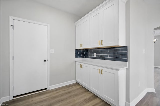 3612 Purebred Dr, Virginia Beach, VA 23453 - laundry area featuring baseboards and light wood-type flooring