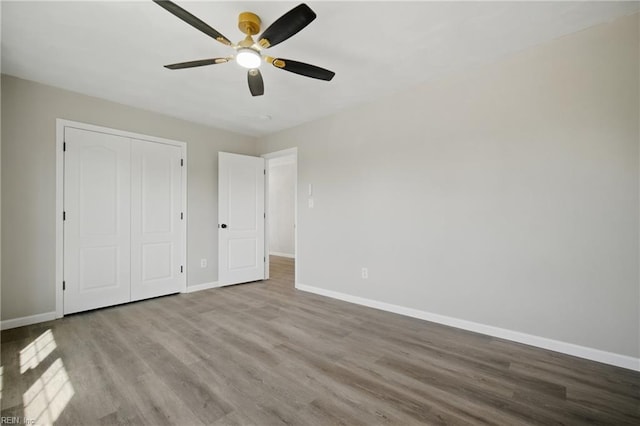 3612 Purebred Dr, Virginia Beach, VA 23453 - unfurnished bedroom featuring baseboards, wood finished floors, and a closet