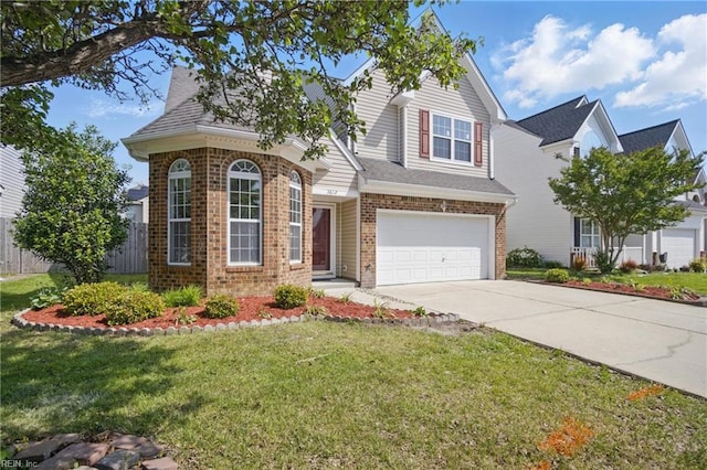 3612 Purebred Dr, Virginia Beach, VA 23453 - view of front facade featuring a garage, a front lawn, fence, brick siding, and driveway