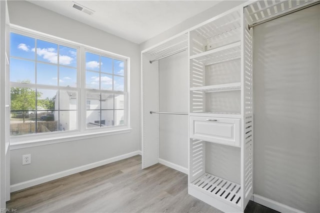 3612 Purebred Dr, Virginia Beach, VA 23453 - spacious closet featuring visible vents and wood finished floors