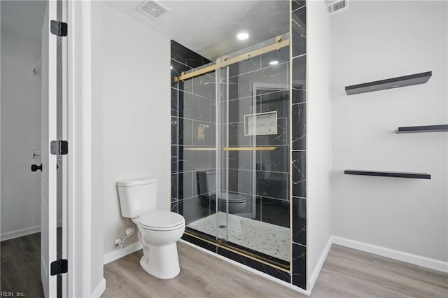 3612 Purebred Dr, Virginia Beach, VA 23453 - full bath featuring visible vents, wood finished floors, toilet, and a shower stall