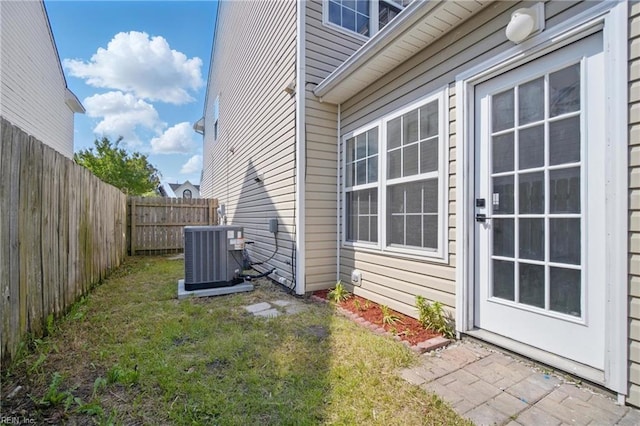 3612 Purebred Dr, Virginia Beach, VA 23453 - exterior space with central air condition unit, a lawn, and a fenced backyard