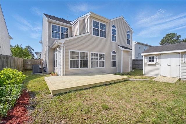 3612 Purebred Dr, Virginia Beach, VA 23453 - rear view of house featuring a lawn, a wooden deck, a fenced backyard, and central AC unit
