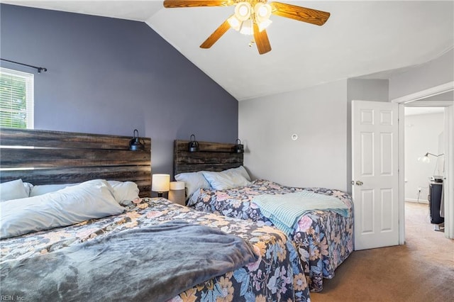 bedroom featuring carpet flooring, ceiling fan, and vaulted ceiling