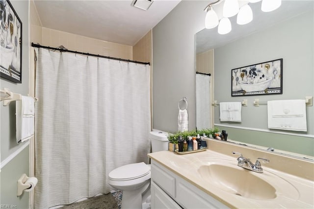 bathroom with vanity, a shower with curtain, toilet, and visible vents