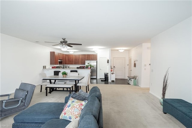 4309 Hillingdon Bnd Unit 303, Chesapeake, VA 23321 - living room featuring ceiling fan, light colored carpet, and baseboards