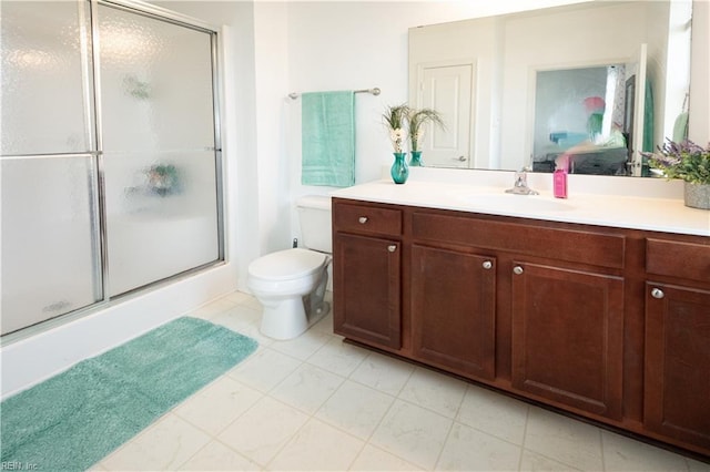 ensuite bathroom featuring vanity, a stall shower, toilet, and ensuite bath
