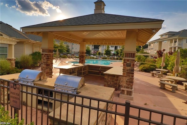 4309 Hillingdon Bnd Unit 303, Chesapeake, VA 23321 - view of patio with area for grilling, a gazebo, grilling area, and a community pool