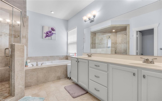 1870 Rockwood Dr, Chesapeake, VA 23323 - bathroom with double vanity, a sink, a bath, and a stall shower