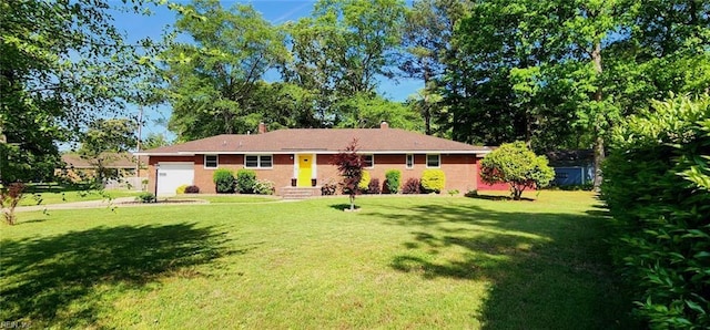 ranch-style house with an attached garage, a chimney, and a front yard