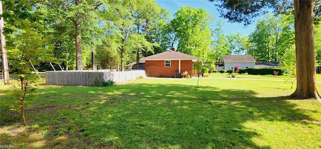 view of yard with fence