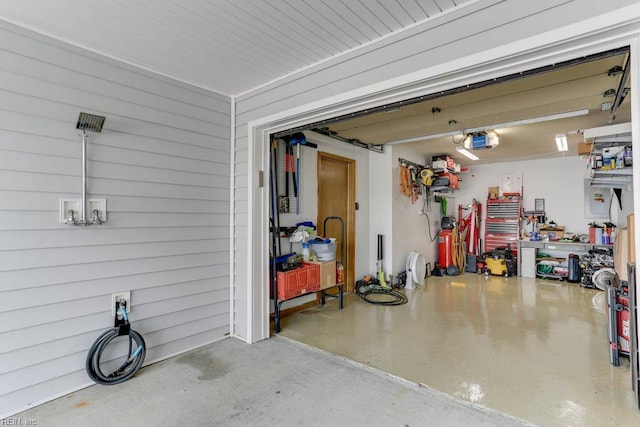 garage featuring a garage door opener