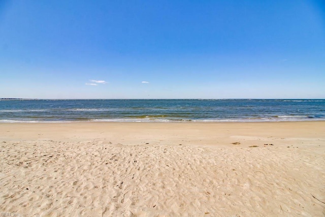property view of water featuring a beach view