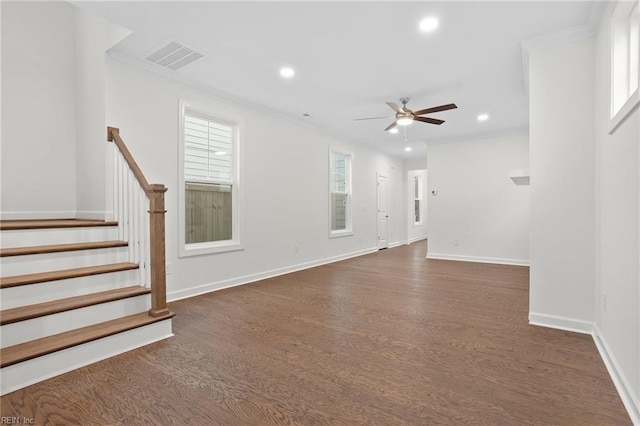unfurnished living room with visible vents, ornamental molding, and dark wood-type flooring