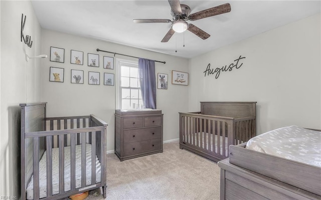 bedroom featuring baseboards, carpet, and a ceiling fan