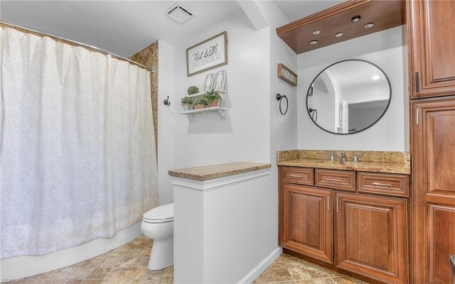 bathroom featuring vanity, shower / bathtub combination with curtain, visible vents, and toilet