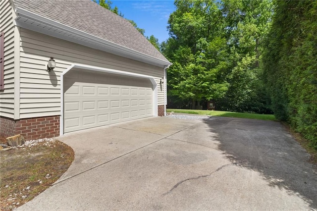 garage featuring driveway