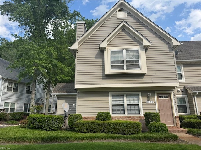 700 Rapidan River Ct Unit D, Chesapeake, VA 23320 - traditional home featuring brick siding and a chimney