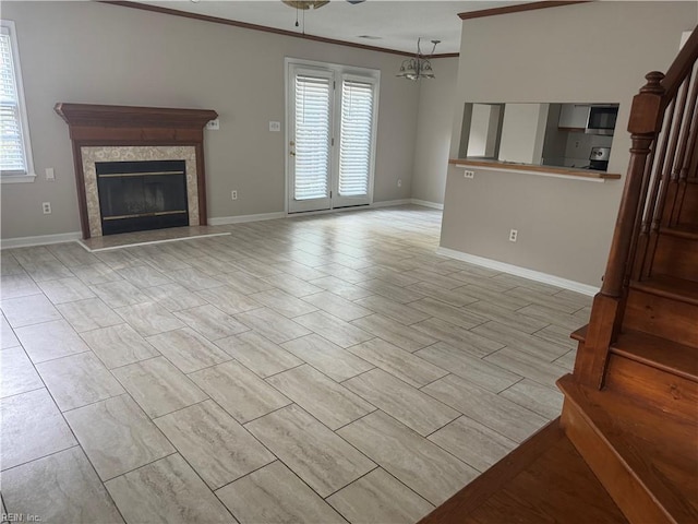 700 Rapidan River Ct Unit D, Chesapeake, VA 23320 - unfurnished living room featuring baseboards, ornamental molding, a wealth of natural light, and stairway