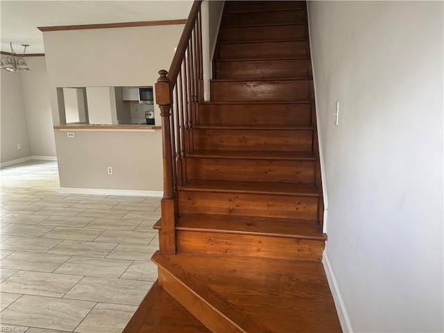 700 Rapidan River Ct Unit D, Chesapeake, VA 23320 - staircase with crown molding, baseboards, and wood finished floors