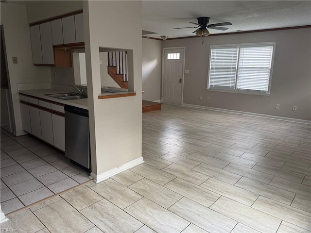 700 Rapidan River Ct Unit D, Chesapeake, VA 23320 - kitchen featuring ceiling fan, a sink, baseboards, open floor plan, and stainless steel dishwasher
