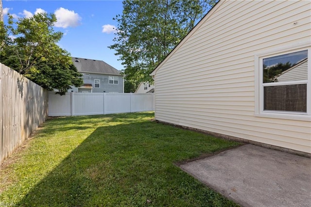 view of yard featuring a fenced backyard and a patio