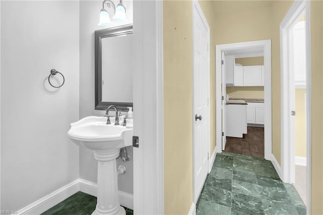 bathroom with baseboards