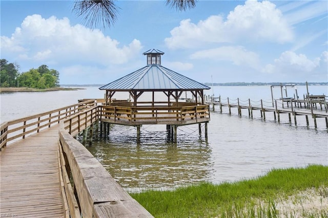 dock area featuring a water view and a gazebo