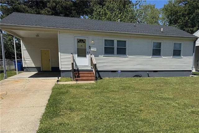 view of front facade featuring a front lawn, driveway, crawl space, and entry steps