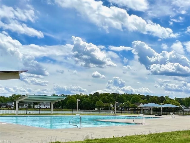 community pool with fence