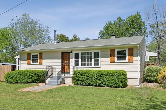view of front of property featuring a chimney and a front lawn