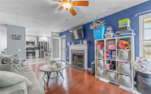 3116 Crosstimber Way, Virginia Beach, VA 23456 - living area with ceiling fan, wood finished floors, and a tile fireplace