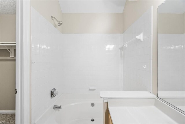 bathroom featuring bathing tub / shower combination