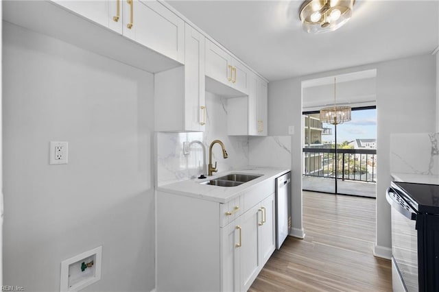 2830 Shore Dr Unit 405, Virginia Beach, VA 23451 - kitchen featuring stainless steel dishwasher, range with electric stovetop, white cabinetry, a sink, and light wood finished floors