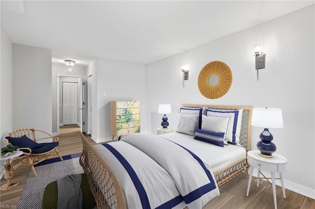 2830 Shore Dr Unit 405, Virginia Beach, VA 23451 - bedroom featuring baseboards and wood finished floors