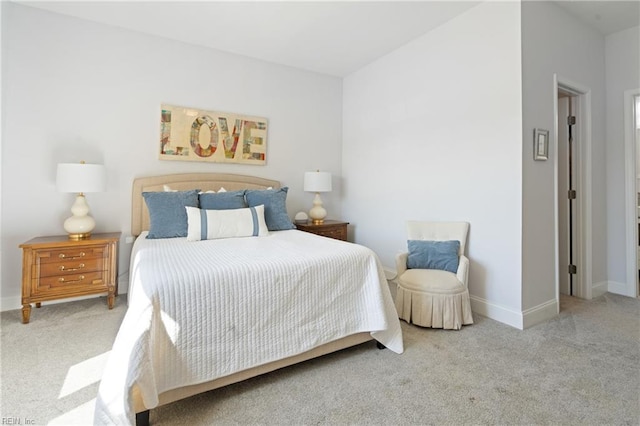 carpeted bedroom with baseboards