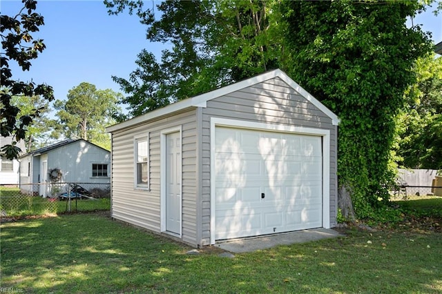 detached garage with fence