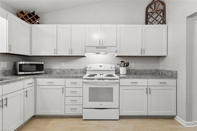 kitchen with white range with electric stovetop, light wood finished floors, stainless steel microwave, under cabinet range hood, and vaulted ceiling