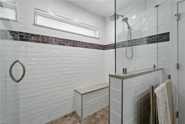 828 Vanderbilt Ave, Virginia Beach, VA 23451 - bathroom featuring a walk in shower and tile walls
