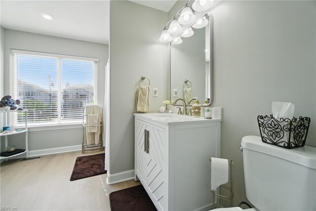 828 Vanderbilt Ave, Virginia Beach, VA 23451 - full bath with vanity, toilet, recessed lighting, baseboards, and wood finished floors
