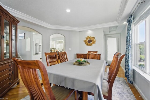 828 Vanderbilt Ave, Virginia Beach, VA 23451 - dining space with arched walkways, ornamental molding, wood finished floors, and plenty of natural light