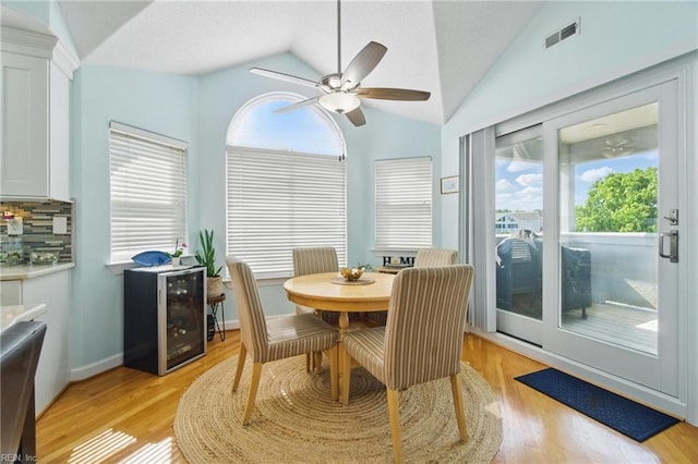 828 Vanderbilt Ave, Virginia Beach, VA 23451 - dining room featuring a ceiling fan, visible vents, light wood-style flooring, and lofted ceiling