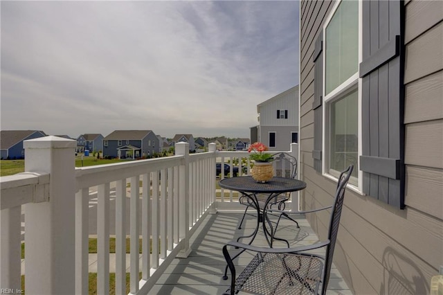 balcony featuring a residential view