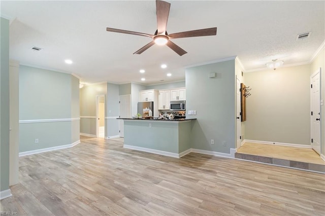 unfurnished living room featuring a ceiling fan, visible vents, crown molding, recessed lighting, and light wood-style flooring