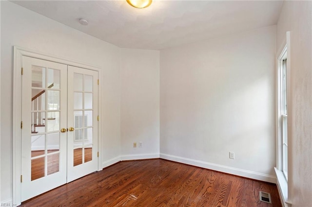 419 Hastings Pl, Suffolk, VA 23433 - unfurnished room with dark wood-style flooring, french doors, baseboards, a wealth of natural light, and visible vents