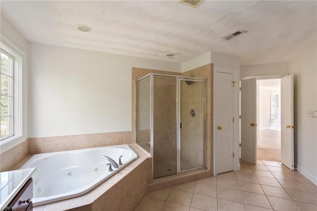 419 Hastings Pl, Suffolk, VA 23433 - full bathroom featuring tile patterned floors, plenty of natural light, a whirlpool tub, and a shower stall