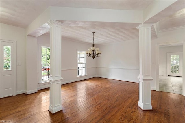 419 Hastings Pl, Suffolk, VA 23433 - entryway featuring ornate columns, a healthy amount of sunlight, and wood finished floors