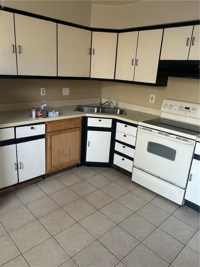 kitchen with light countertops, white range with electric cooktop, a sink, and range hood