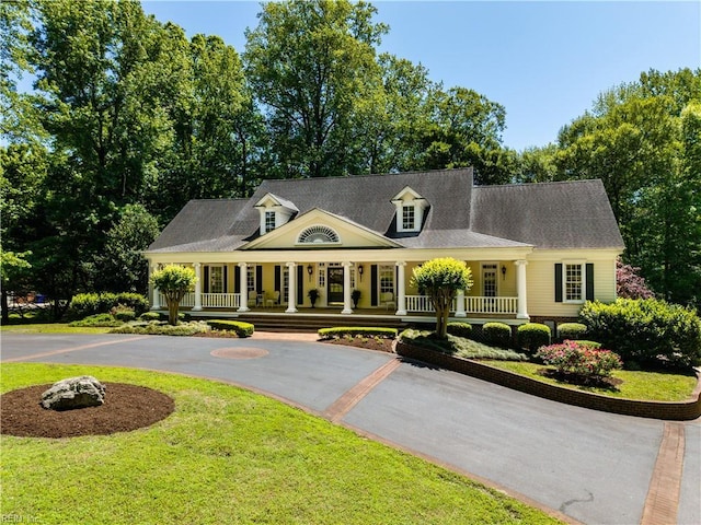1263 Murphys Mill Rd, Suffolk, VA 23434 - view of front of property with curved driveway, covered porch, and a front lawn