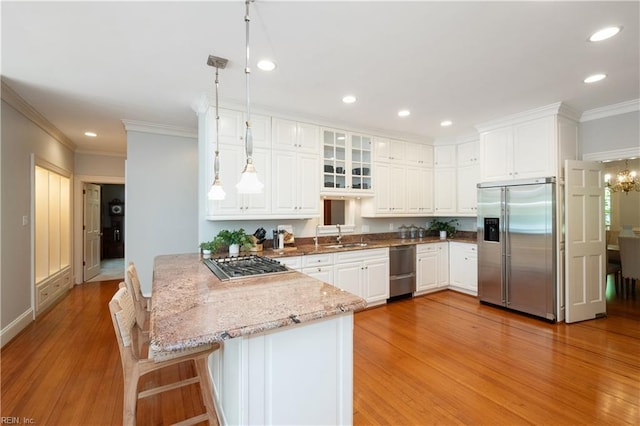 1263 Murphys Mill Rd, Suffolk, VA 23434 - kitchen with recessed lighting, appliances with stainless steel finishes, white cabinetry, and light wood-style floors